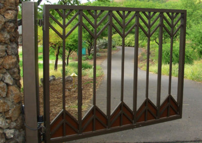 Designed metal entry gate with arrow motif